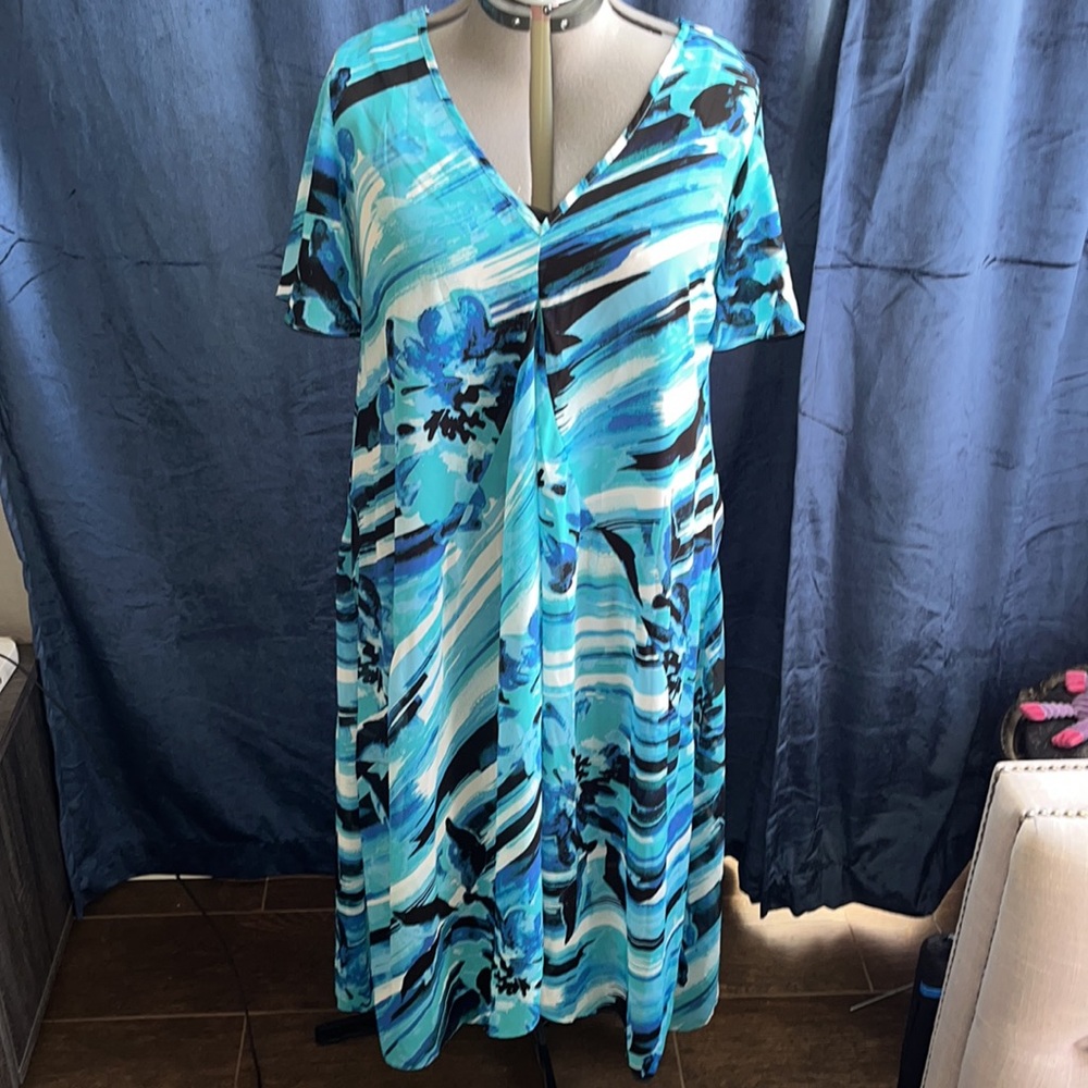 Sheer flowy dress with slip.